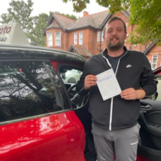 Happy learner driver passing driving test in Wakefield